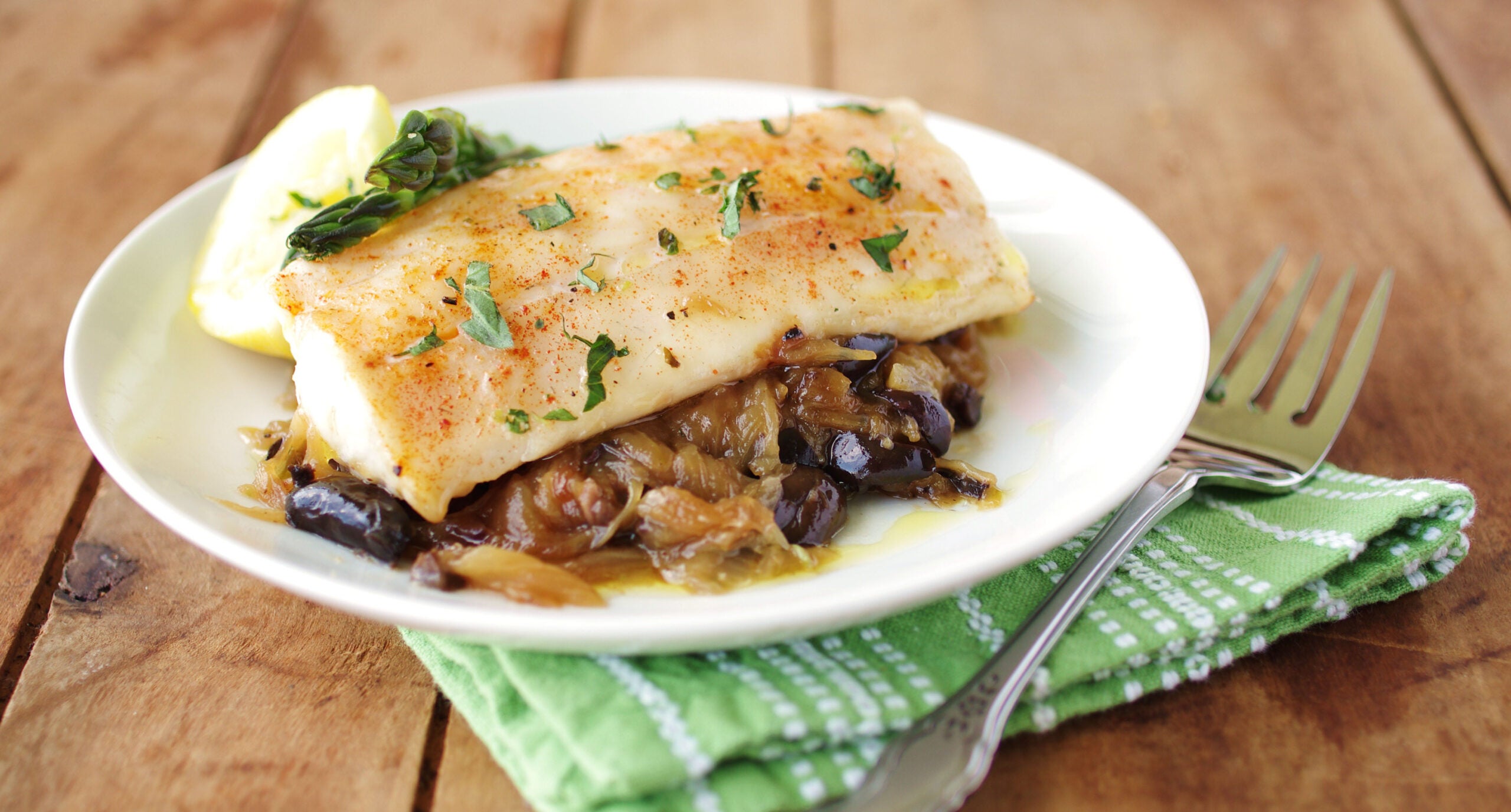 Recipe for Fish roasted on caramelized onions
