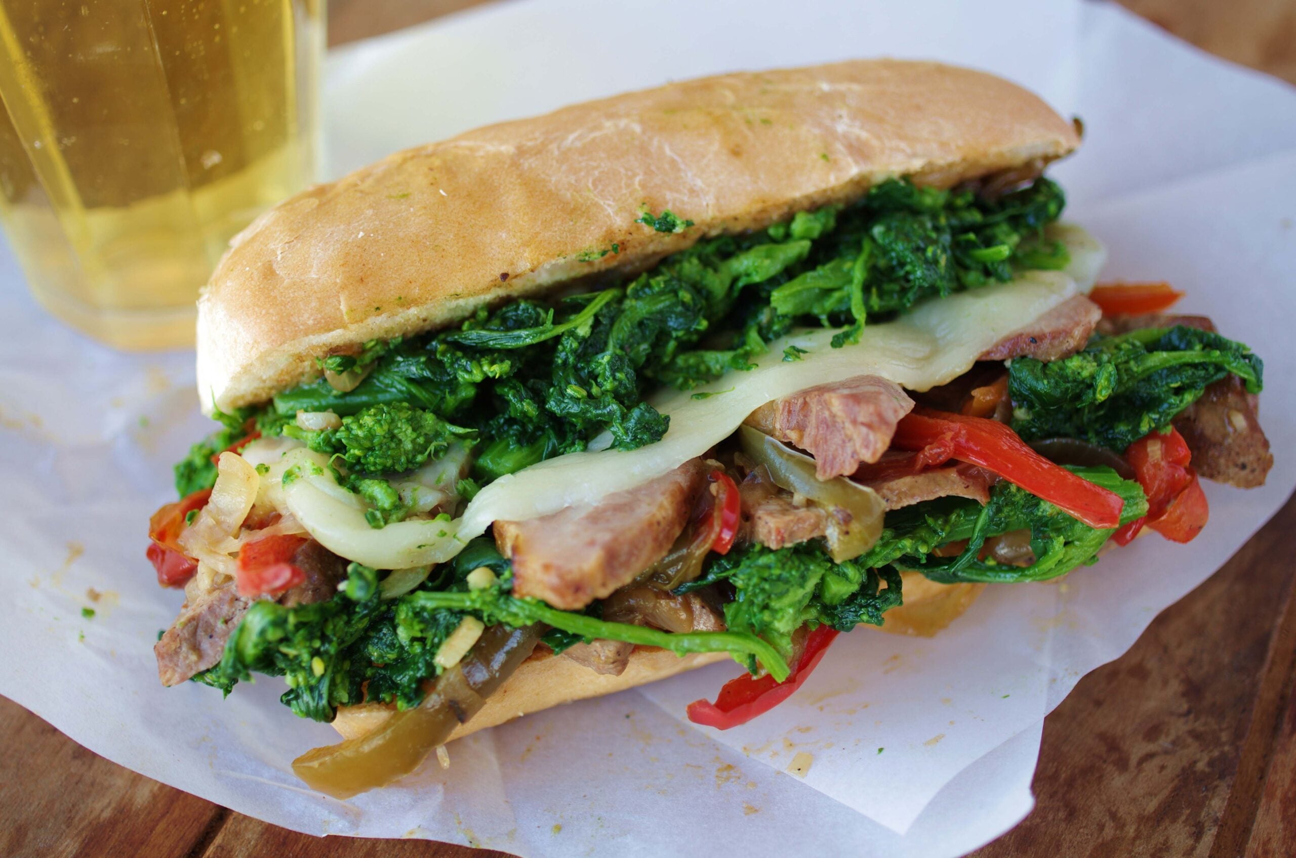 Recipe for Phillystyle hot pork sandwiches with broccoli rabe