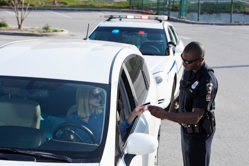 police officers giving a ticket