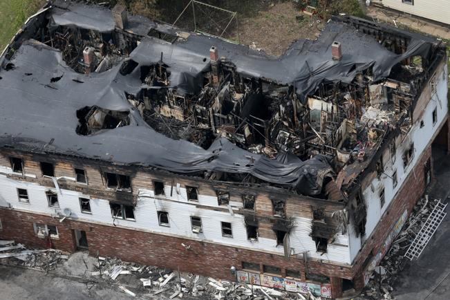 Officials: Investigation of Lowell Fire That Killed 7 Begins