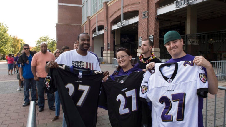 Baltimore Ravens fans wearing Ray Rice jerseys