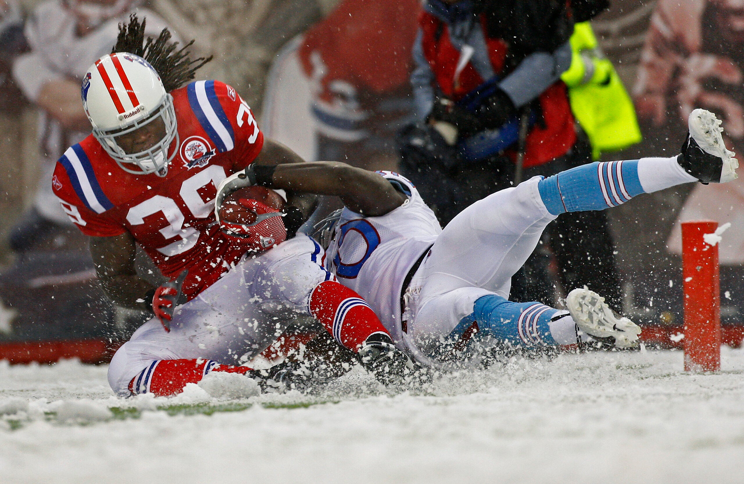 Patriots' defense, running game hold off Bills in bad-weather bowl