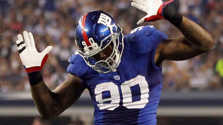 New York Giants defensive end Jason Pierre-Paul (90) knocks the