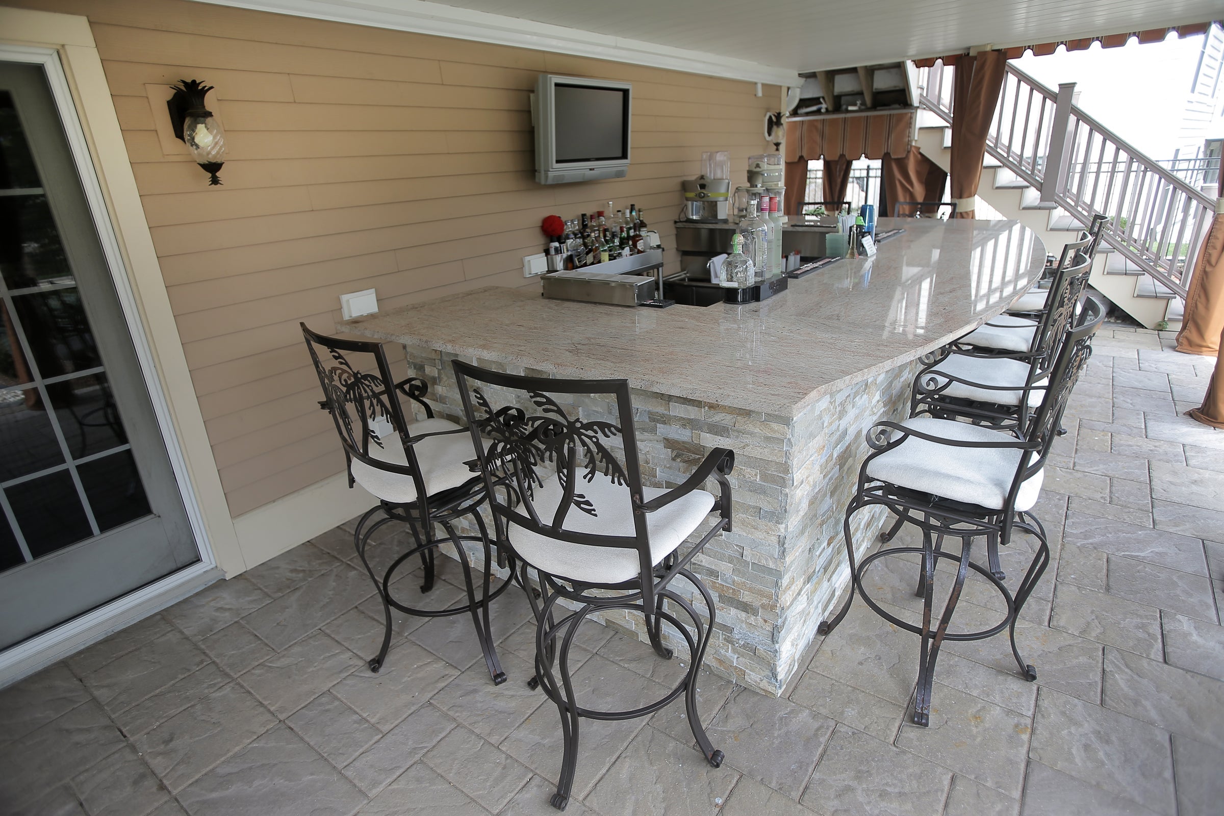 Saugus home with a backyard kitchen fit for a grilling aficionado