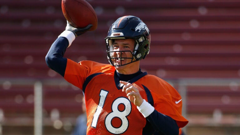 NO FILM, NO VIDEO, NO TV, NO DOCUMENTARY - Denver Broncos starting  quarterback Peyton Manning (18) throws against the Carolina Panthers during  the second quarter of Super Bowl 50 at Levi's Stadium