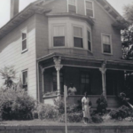 Ella Little-Collins and Sara Little in front of the Roxbury home where Malcolm X lived.