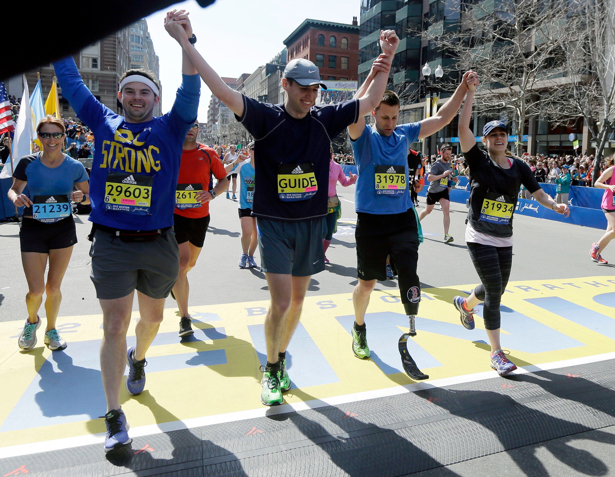 Marathon bombing survivor Patrick Downes says he ran with Boston