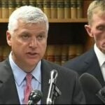 Suffolk County District Attorney Dan Conley and Boston Police Commissioner William Evans