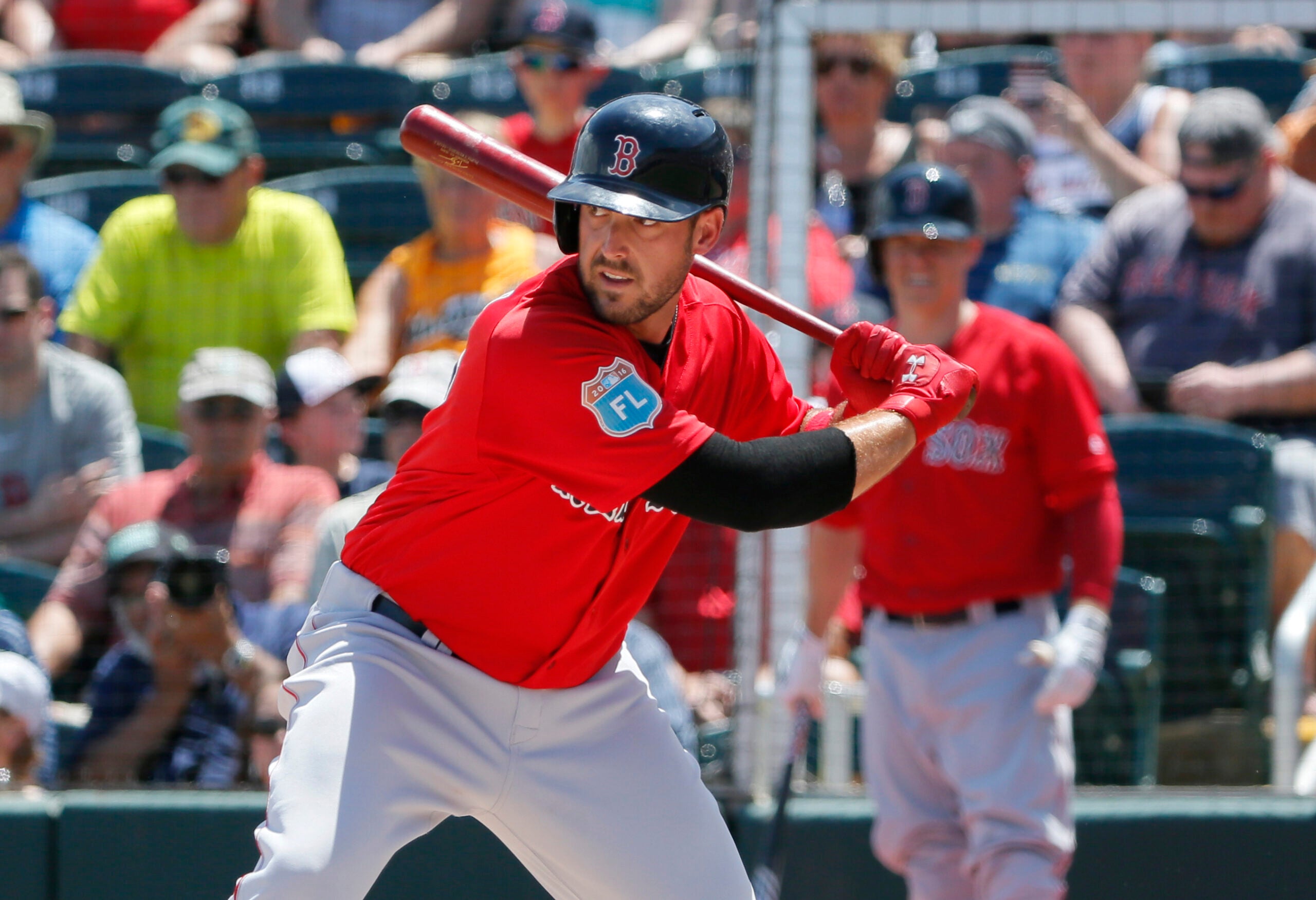 Boston Red Sox catcher CHRISTIAN VAZQUEZ talks with relief pitcher JUNICHI  TAZAWA