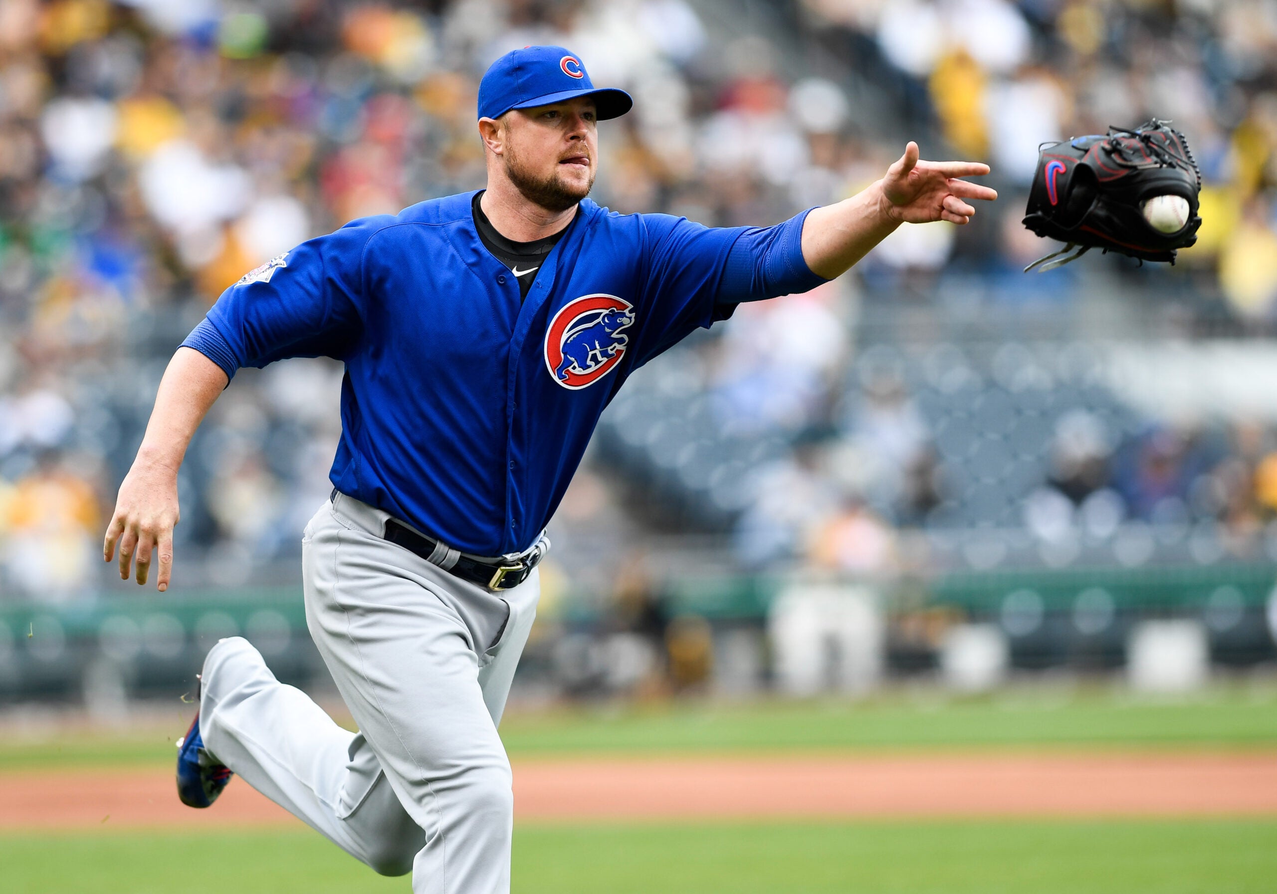 Jon Lester is getting really good at dealing with the ball getting stuck in  his glove
