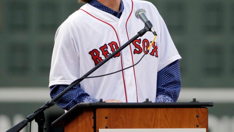 Boston, MA - Red Sox players all wearing Johnny Pesky's jersey in