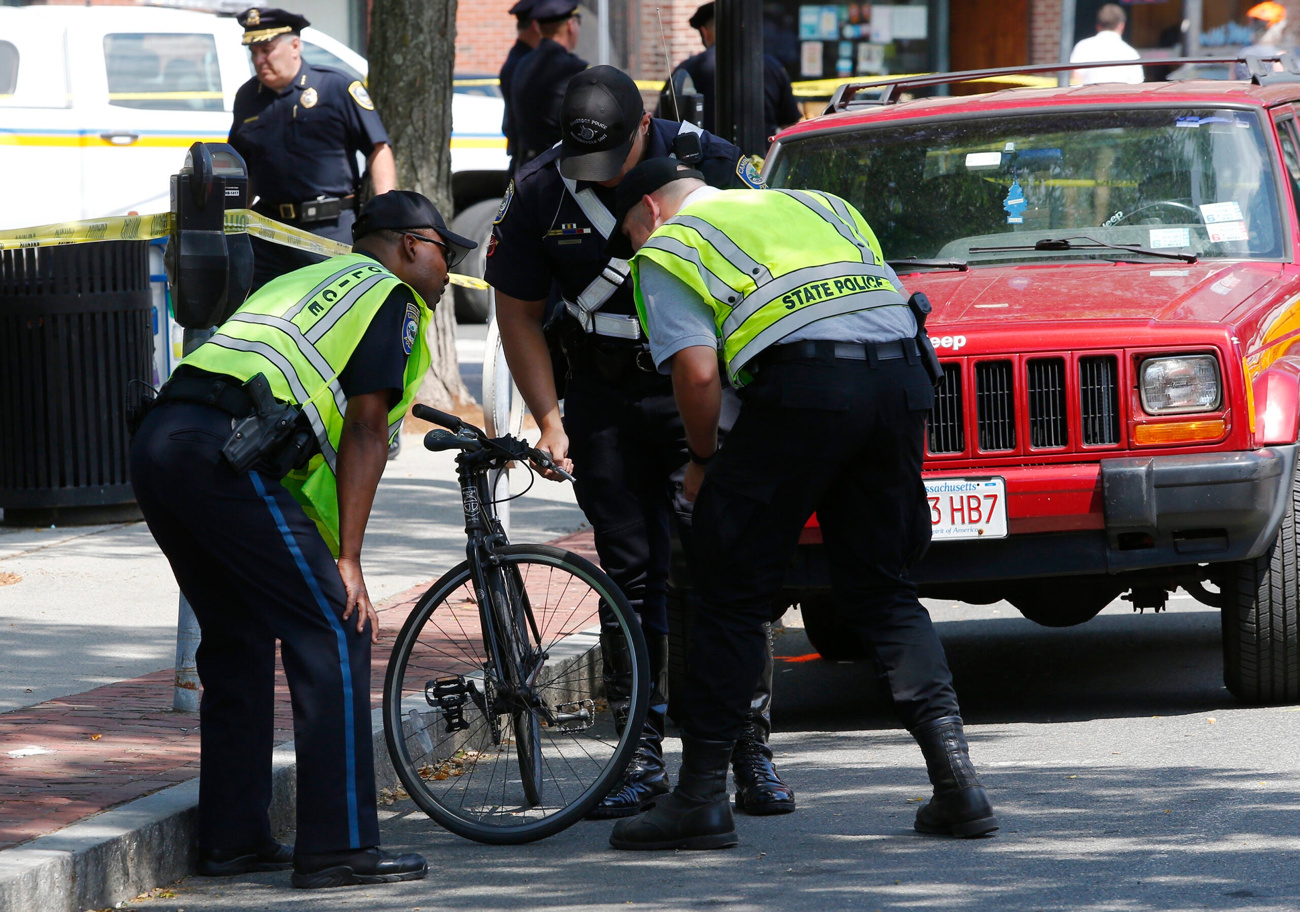 Police: Cyclist dies after open car door knocked her into passing dump ...