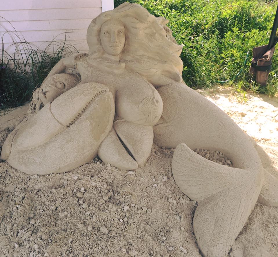 Sand sculpture of busty Cape Cod mermaid draws complaints.