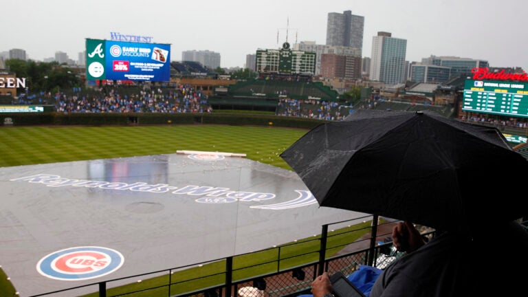 Bucket on head might have saved fan injured at Wrigley Field