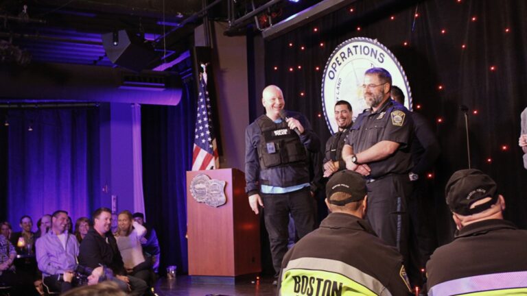 Comedian Jeff Ross sizes up Steve Horgan, better known to Red Sox fans as "Bullpen Cop," during a charity roast.
