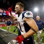 New England Patriots wide receiver Julian Edelman (11) leaves the field after an NFL football game against the Arizona Cardinals, Sunday, Sept. 11, 2016, in Glendale, Ariz. The Patrios won 23-21. (AP Photo/Ross D. Franklin)