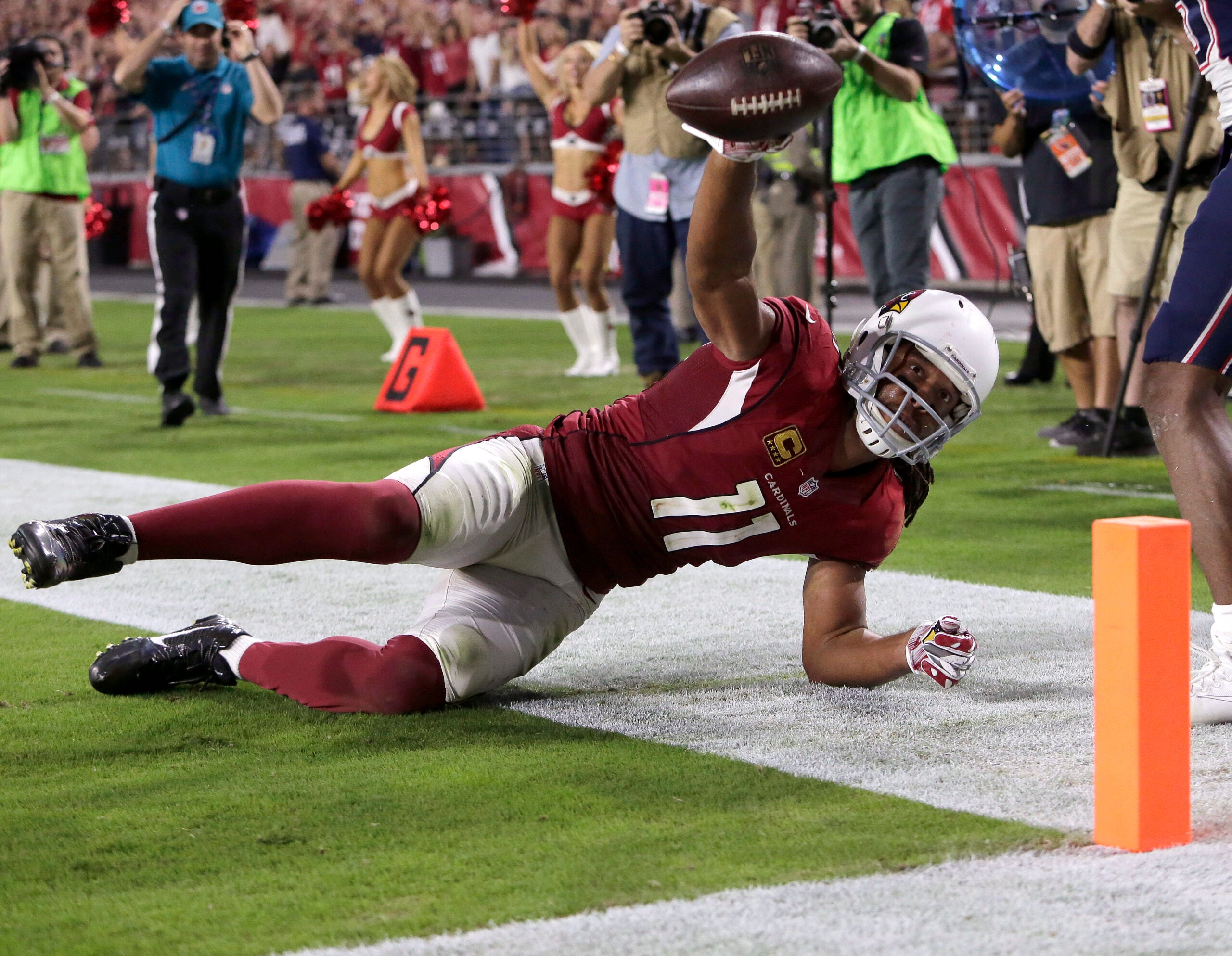 Former Cardinals wide receiver Larry Fitzgerald stops by to watch