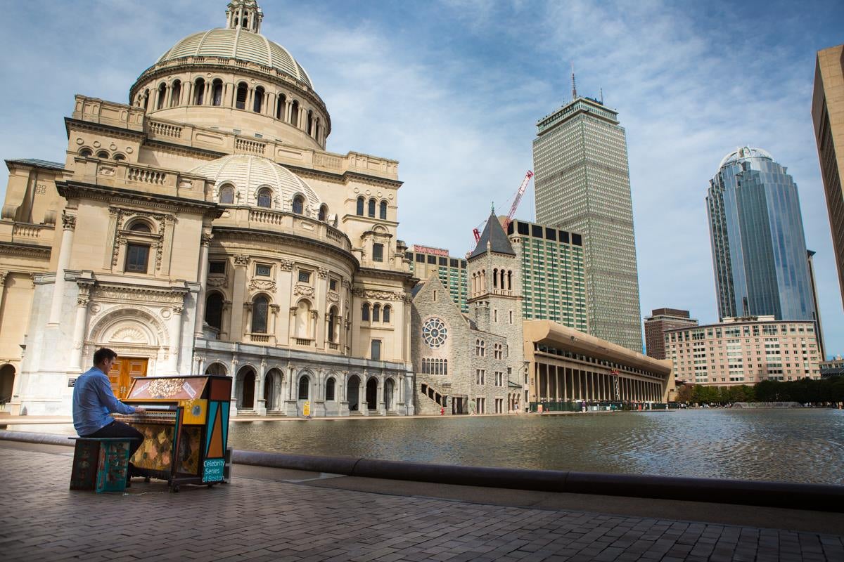 A Street Piano at the Christian Science Plaza reflecting pool.