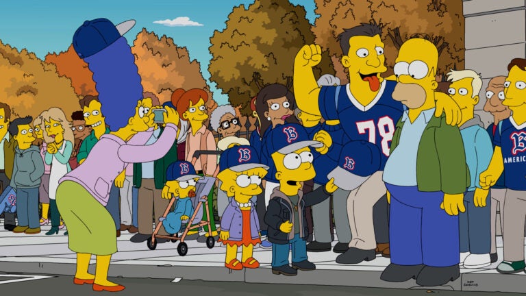 "Dom Bonkowski" with the Simpson family in "The Town."