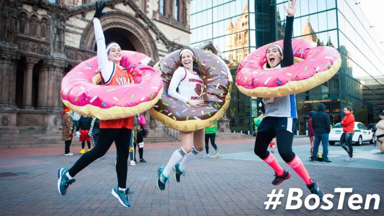 Runners posing at the Boston Common Costume Dash.