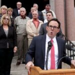 Revere Mayor Brian Arrigo (foreground) spoke during a press conference.