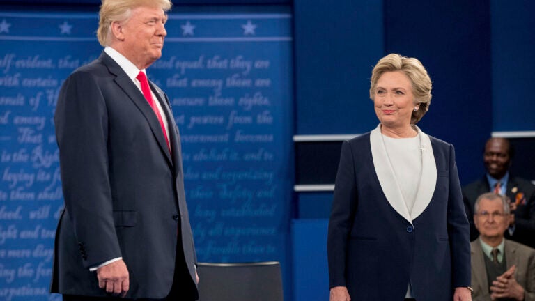 Democratic presidential candidate Hillary Clinton stands next to Republican presidential candidate Donald Trump at the second presidential debate at Washington University, Sunday, Oct. 9, 2016, in St. Louis. (AP Photo/Andrew Harnik)