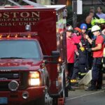 First responders worked to rescue construction workers trapped in a trench.