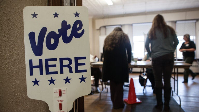 SHELBURNE, MA - MARCH 01: Voters check in before casting their ballots in the Shelburne Town Hall on March 01, 2016 in Shelburne, Massachusetts. Officials are expecting a record turnout of voters in Massachusetts, one of a dozen states holding Super Tuesday presidential primaries or caucuses. (Photo by Matthew Cavanaugh/Getty Images)