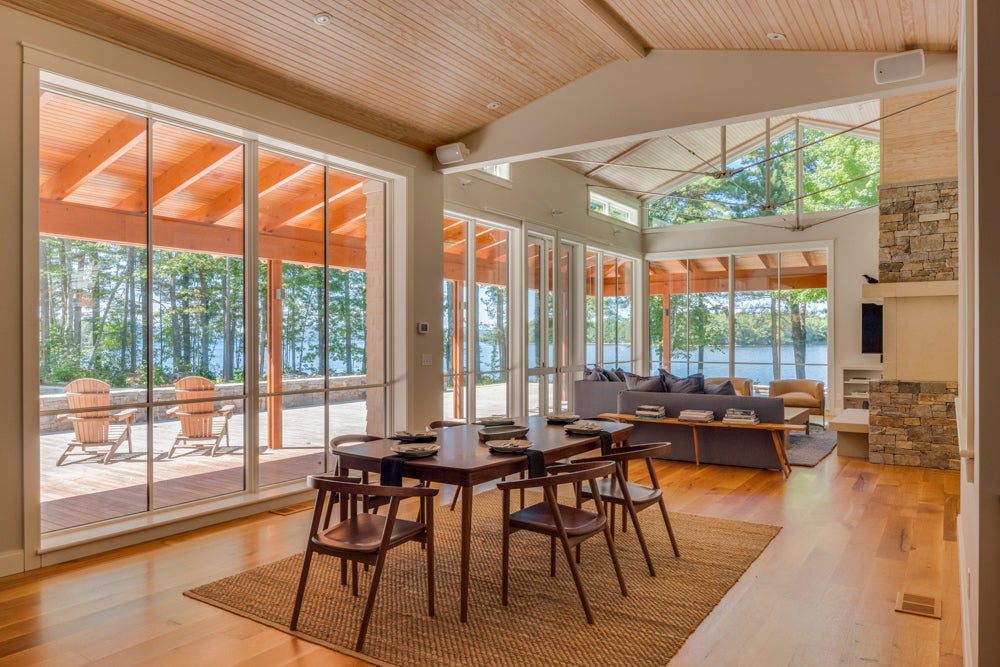 This traditional vacation house on Maine’s Sebago Lake was designed for ...