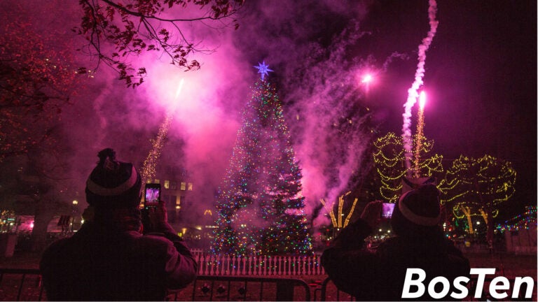 Fireworks explode during 2015's annual Christmas tree lighting on the Common.