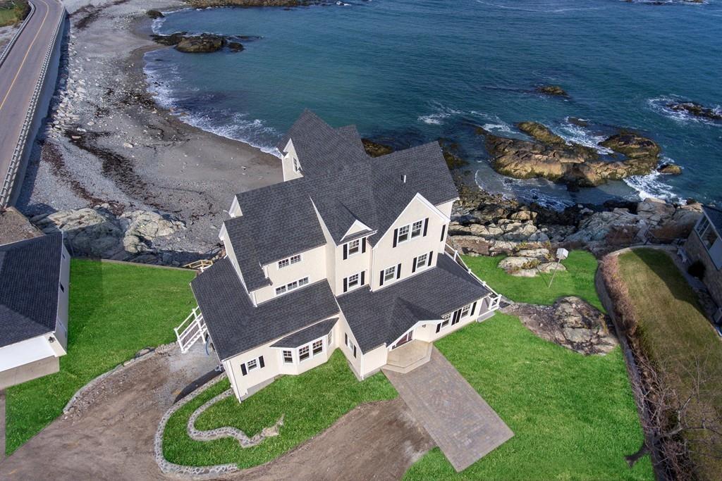 This reconstructed Victorian home in Cohasset has panoramic ocean views