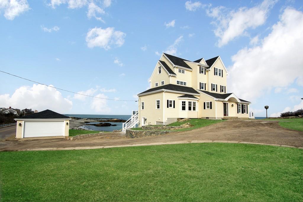This reconstructed Victorian home in Cohasset has panoramic ocean views