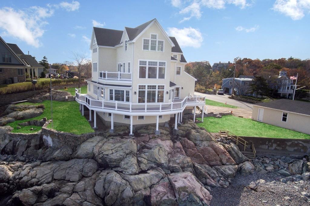 This reconstructed Victorian home in Cohasset has panoramic ocean views