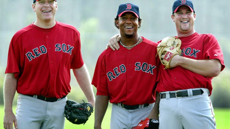 SI Photo Blog — Pedro Martinez hugs winning pitcher Derek Lowe