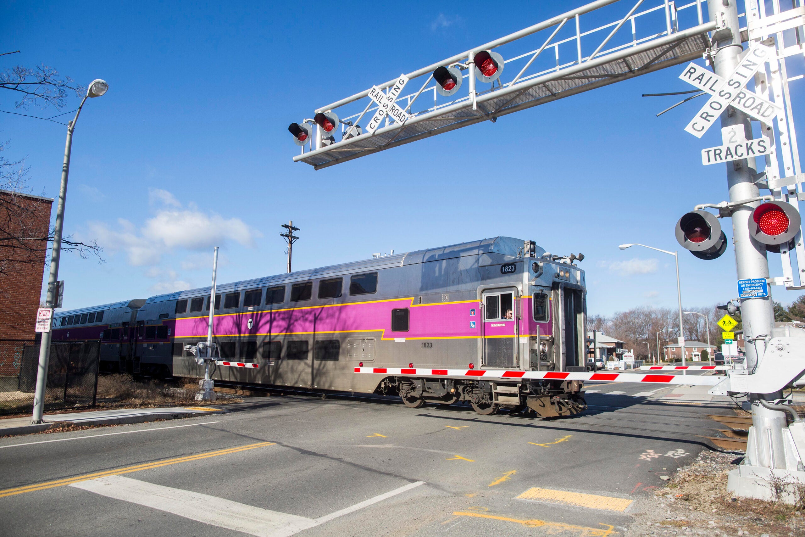 What should you do if you re in a car stuck on train tracks