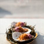 For Travel - 07eventide - Roasted oysters at Eventide Oyster Co. In Portland, Maine. (Jonathan Levitt)
