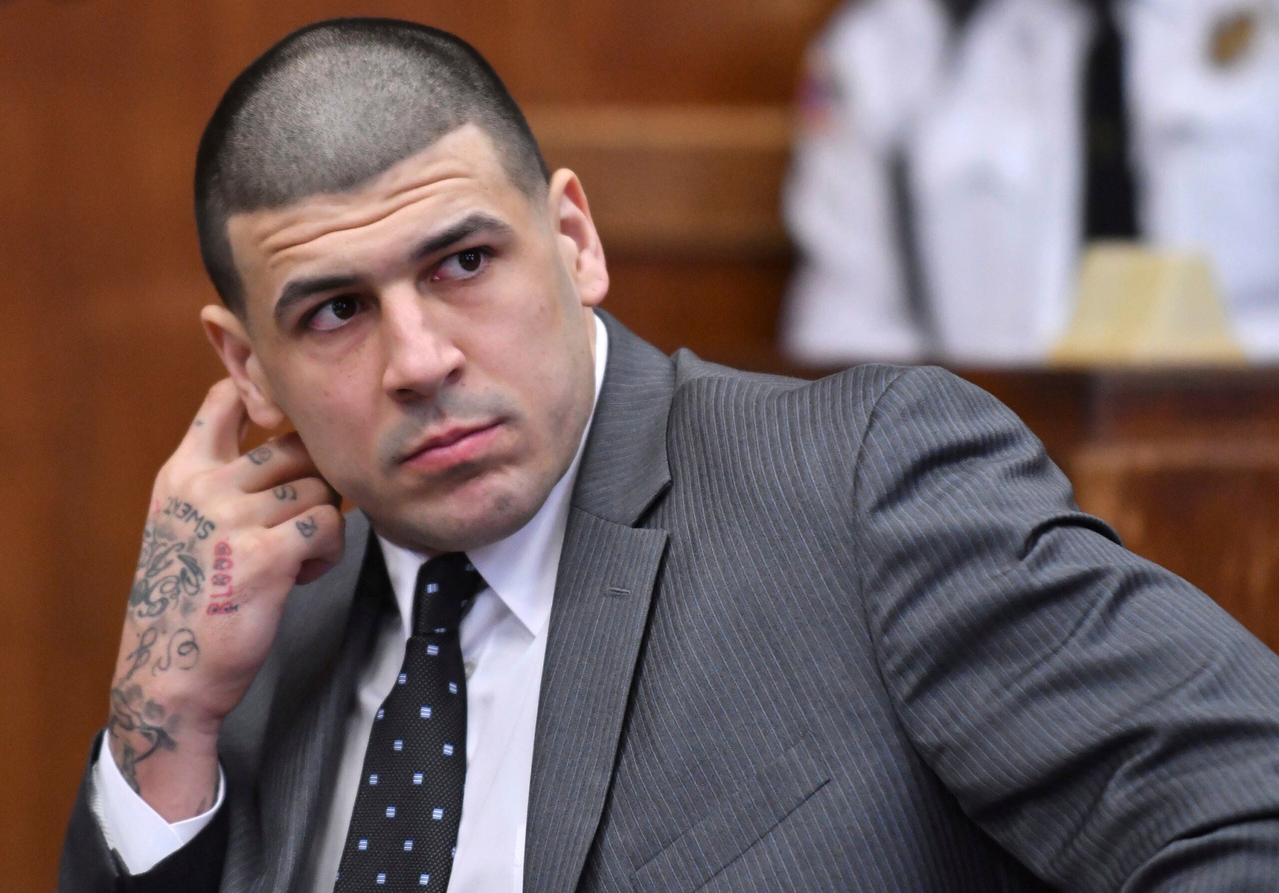 Photos: Aaron Hernandez appears to have new prison neck tattoo - Sports  Illustrated