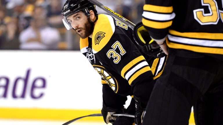 Bruins' Patrice Bergeron sidelined at least a month with rib