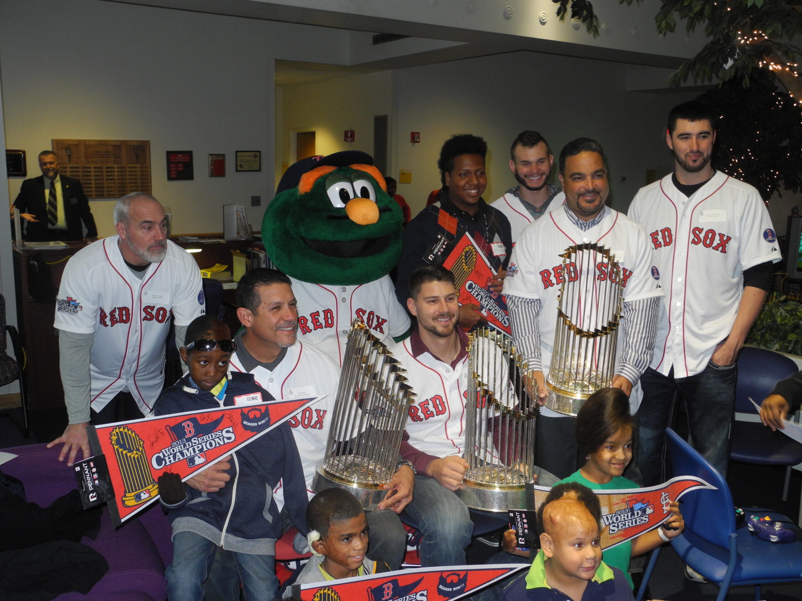 Red Sox mascot Wally visits with the World Series Trophy 