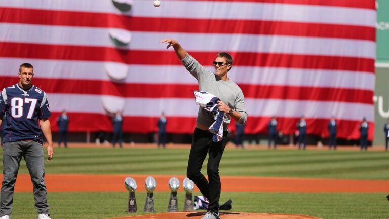 Tom Brady's first pitch connected with Dustin Pedroia before the
