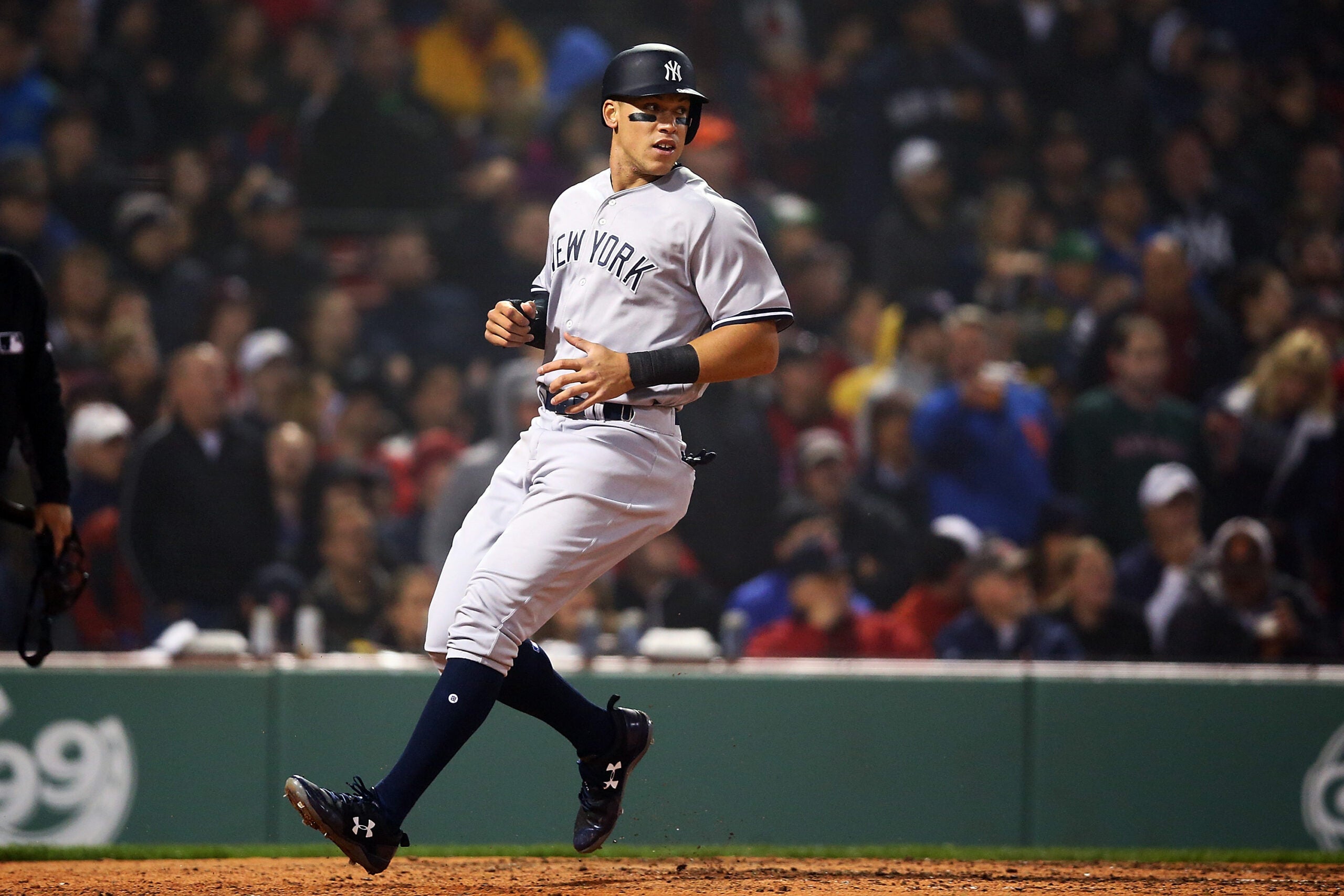 A Yankees fan was really happy to catch a Red Sox home run