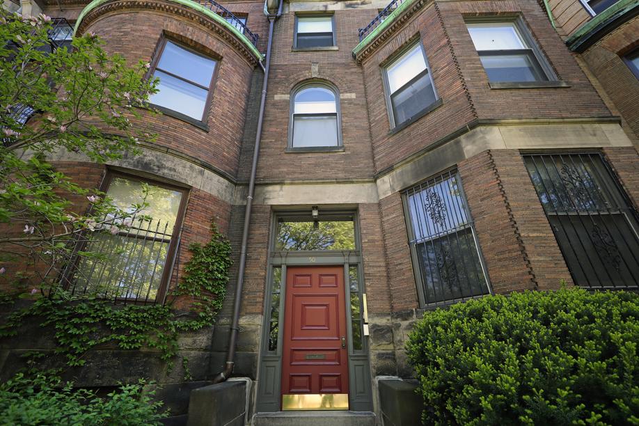 Two-bedroom condo with exposed brick overlooks Back Bay Fens