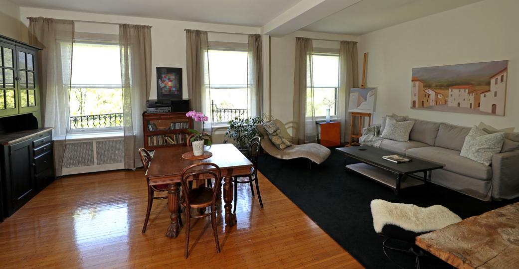 Two-bedroom condo with exposed brick overlooks Back Bay Fens