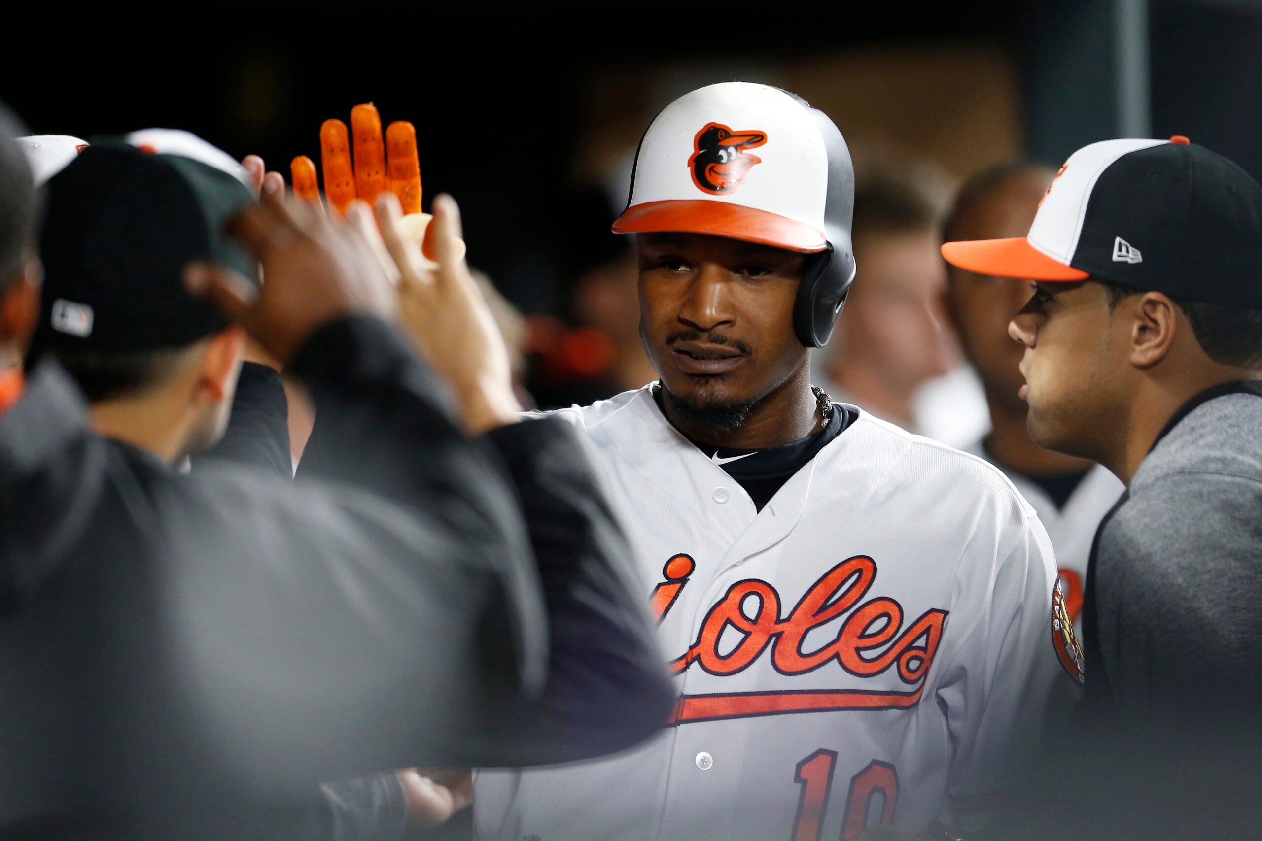 Baltimore Orioles Adam Jones celebrates with fans after the