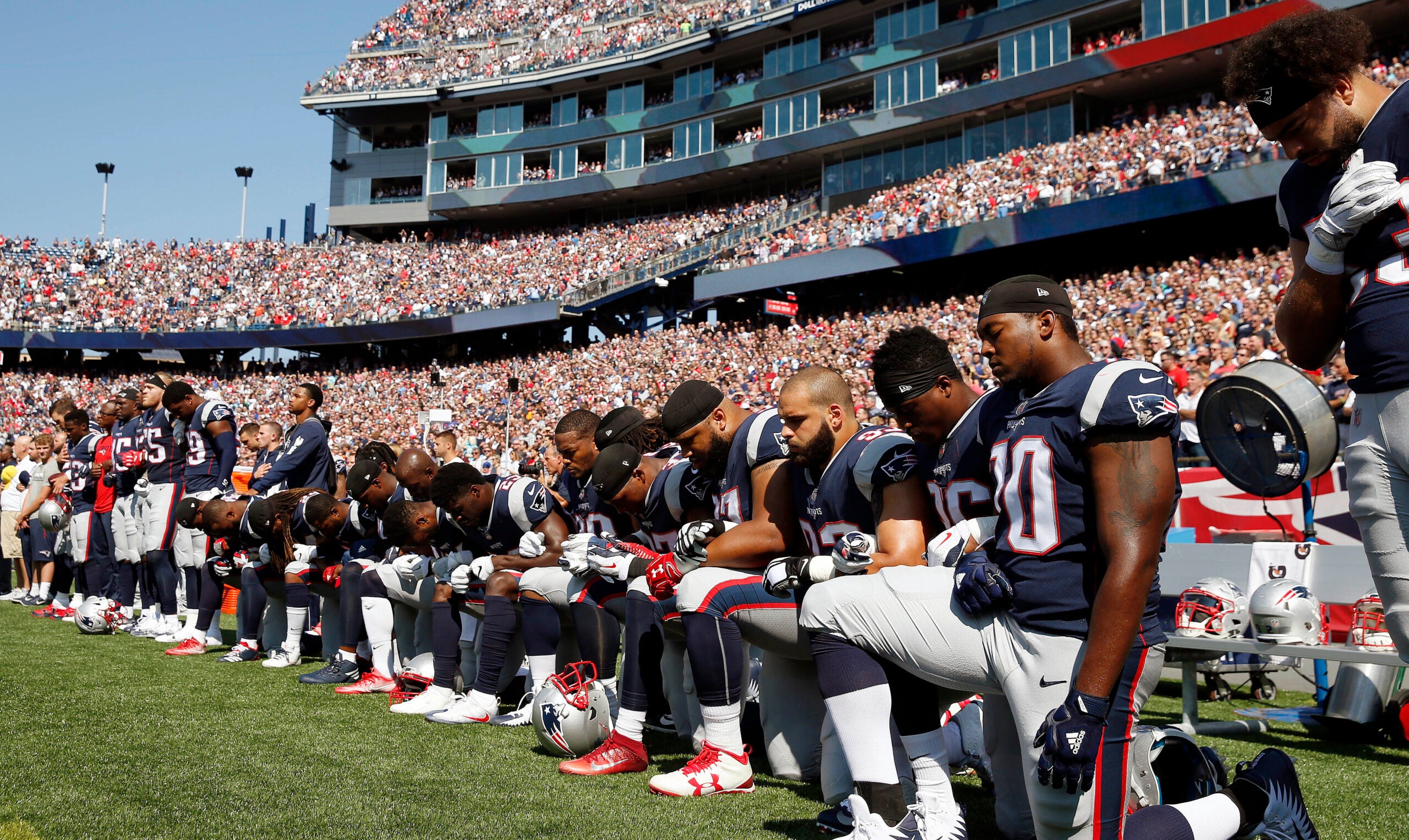 Some kneel, some stand and some stay in the locker room for 2