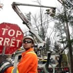 Lineman Holds Stop Sign in Maine