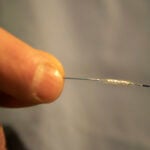 A Doctor Holds a Heart Stent