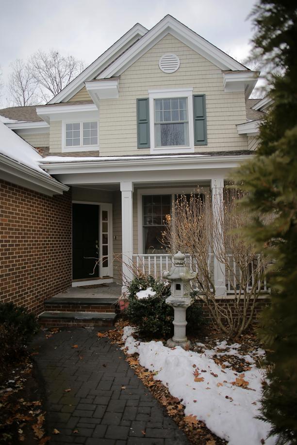 Wayland condo offers finished basement, fireplaces