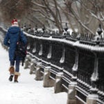Woman walking in snow