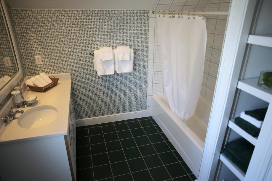 Dedham condo features reclaimed mantels, church windows